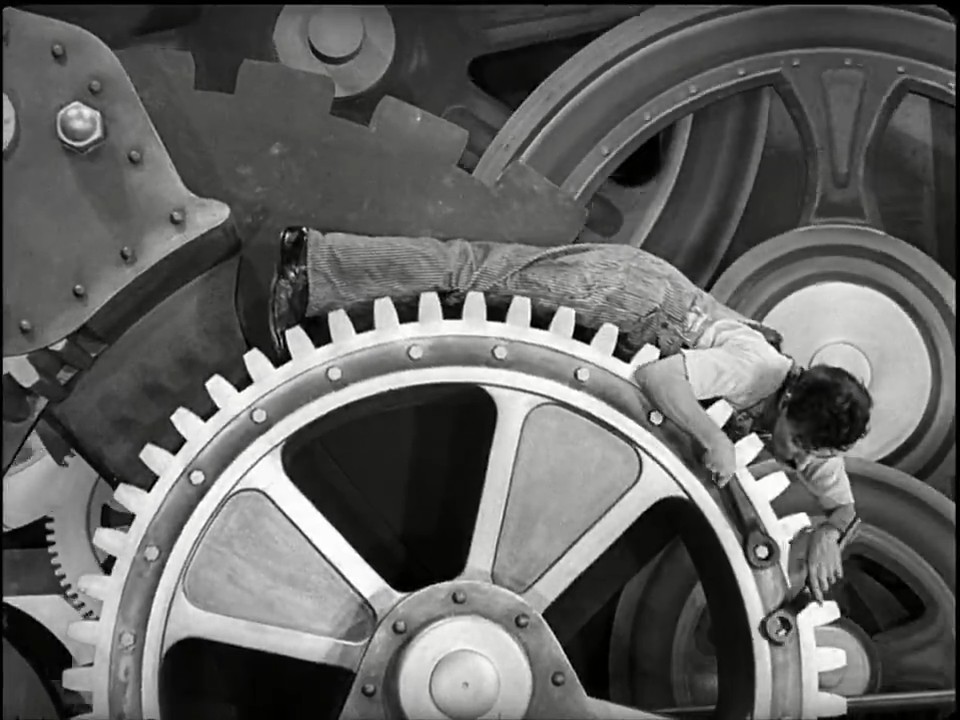 In this iconic scene from the film, Charlie Chaplin literally becomes a cog in the machine.